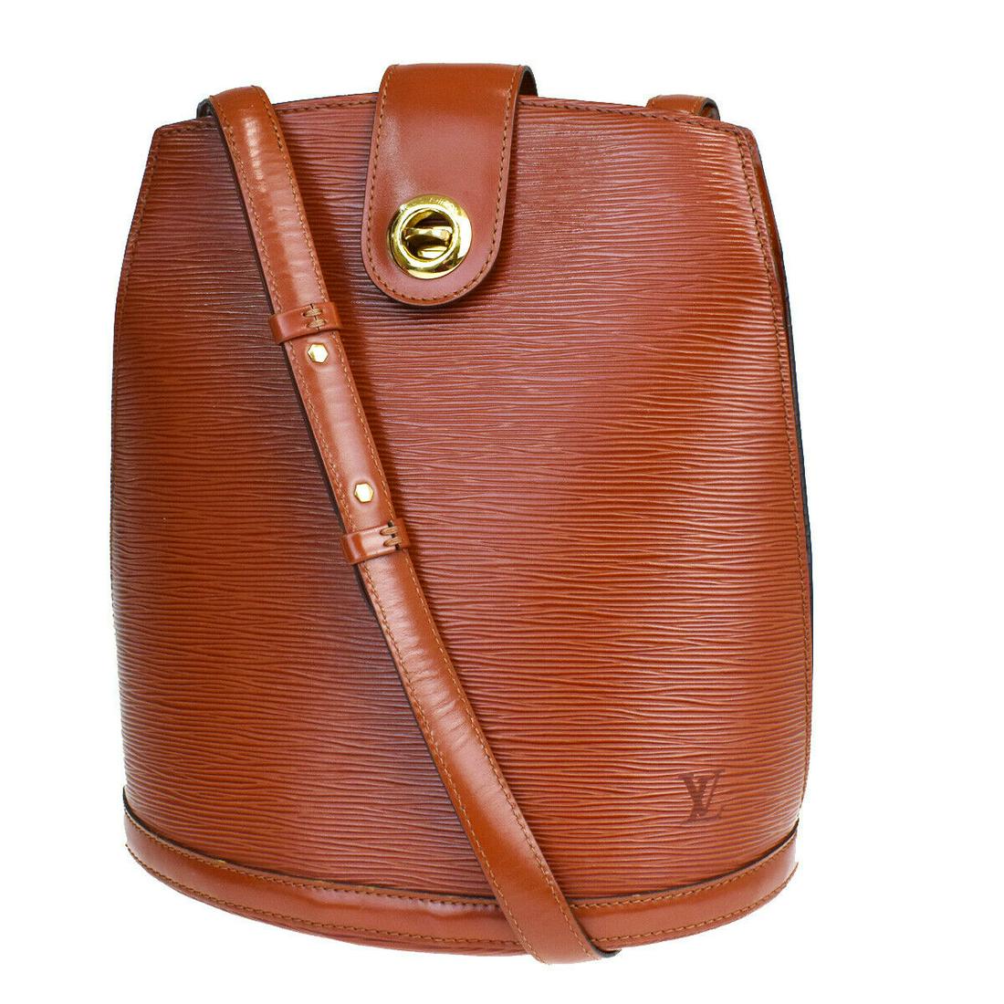 Authentic LOUIS VUITTON LEATHER Epi Leather Shoulder: Brand: LOUIS VUITTON Material: Epi Leather Style: Shoulder Bag Color: Brown Size(inch): W 10.2 x H 11 x D 6.3 "(approx.) Country of Origin: France Come with: - All Bidhaus items come with a 100% money