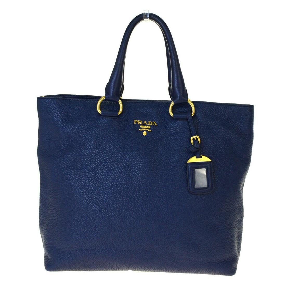 Authentic PRADA Leather Shoulder bag: Brand: PRADA Material: Leather Style: Shoulder bag Color: Blue Size(inch): W 16.1 x H 13.8 x D 6.3 "(approx.) Country of Origin: India Come with: - All Bidhaus items come with a 100% money-back authen