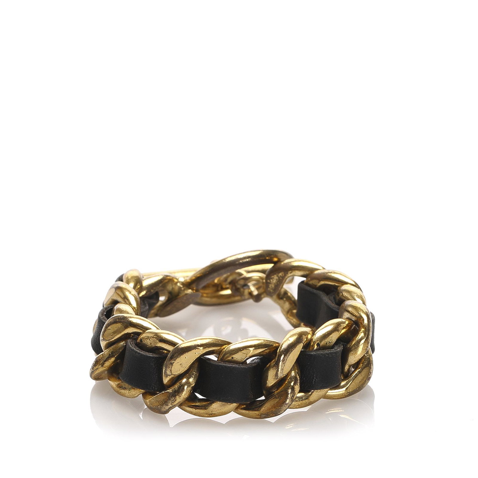 Authentic Chanel Leather Woven Chain Bracelet: This bracelet features a leather woven metal body, and a toggle clasp closure.Brand: Chanel Model: Leather Woven Chain Bracelet Origin: France Category: Costume Bracelet Color: Gold x Black Style: Oth