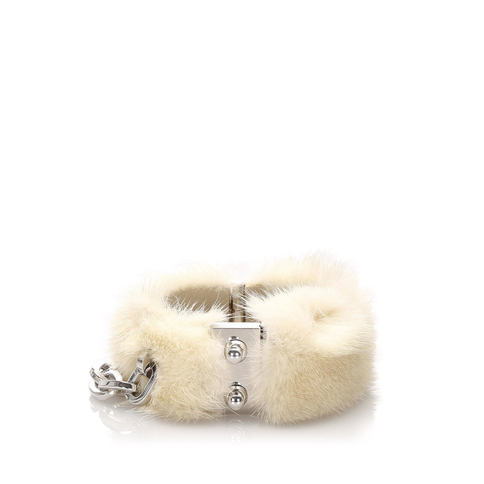 Authentic Louis Vuitton Mink Fur Cuff: This cuff features a fur body, a silver-tone hardware, and a press lock closure.Brand: Louis Vuitton Model: Mink Fur Cuff Origin: France Category: Costume Bracelet Color: White x Silver Style: Others 