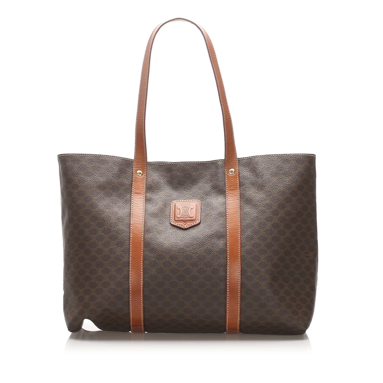 Authentic Celine Macadam Tote Bag: This tote bag features a PVC body, flat leather straps, an open top with magnetic snap button closure, and an interior zip pocket.Brand: Celine Model: Macadam Tote Bag Origin: France Category: Tote Ba