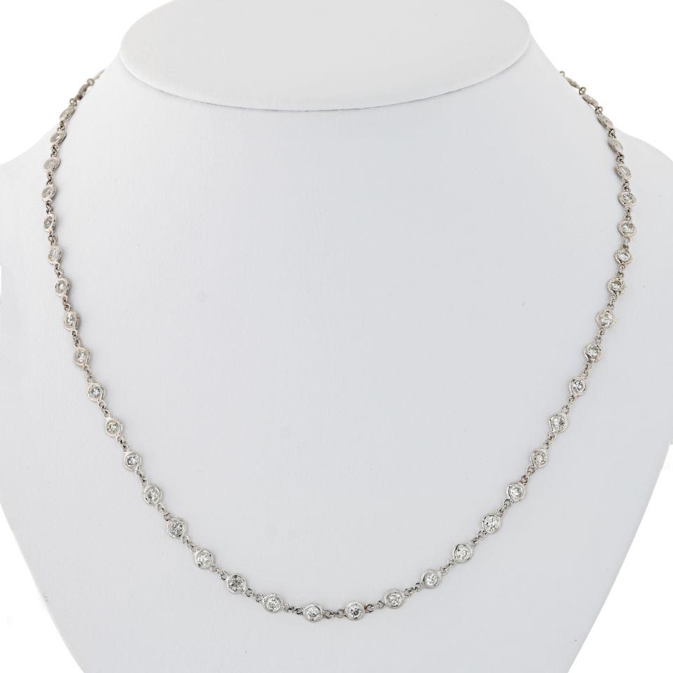 18K White Gold Dia's By Yar: Type: Dia s By Yard Metal: 18K White Gold Grams: 9.7 Exact Diamond Weight: 5 Cts Other Details: w/ 52 RBs