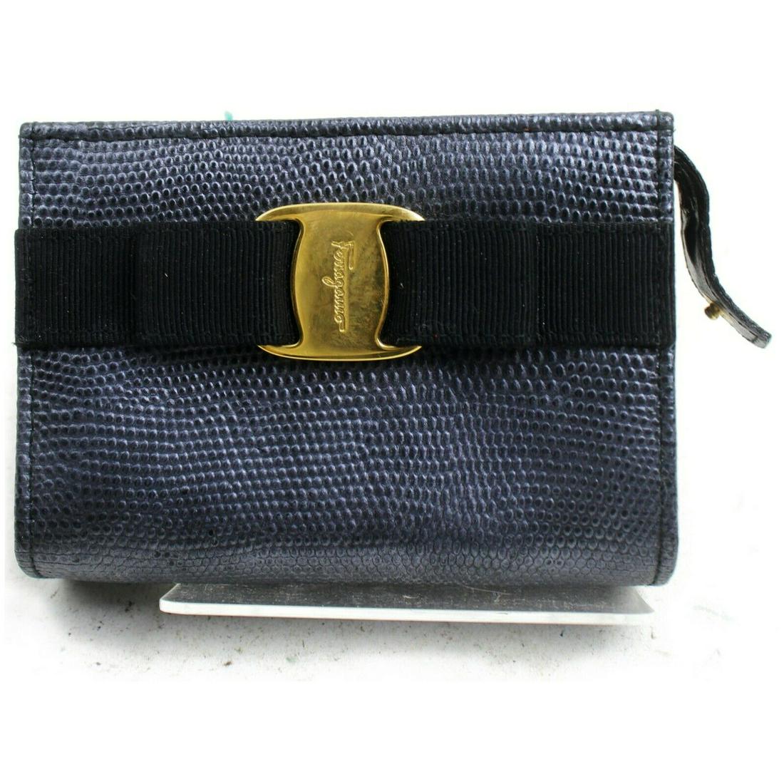 Authentic FERRAGAMO Leather Cigarette Case: Brand: FERRAGAMO Material: Leather Style: Cigarette Case Color: Dark Blue Size(inch): W4.72 inch(approx) /12 cm(approx) x H3.14 inch(approx) /8 cm(approx) x D1.57 inch(approx) /4 cm(approx) " Country