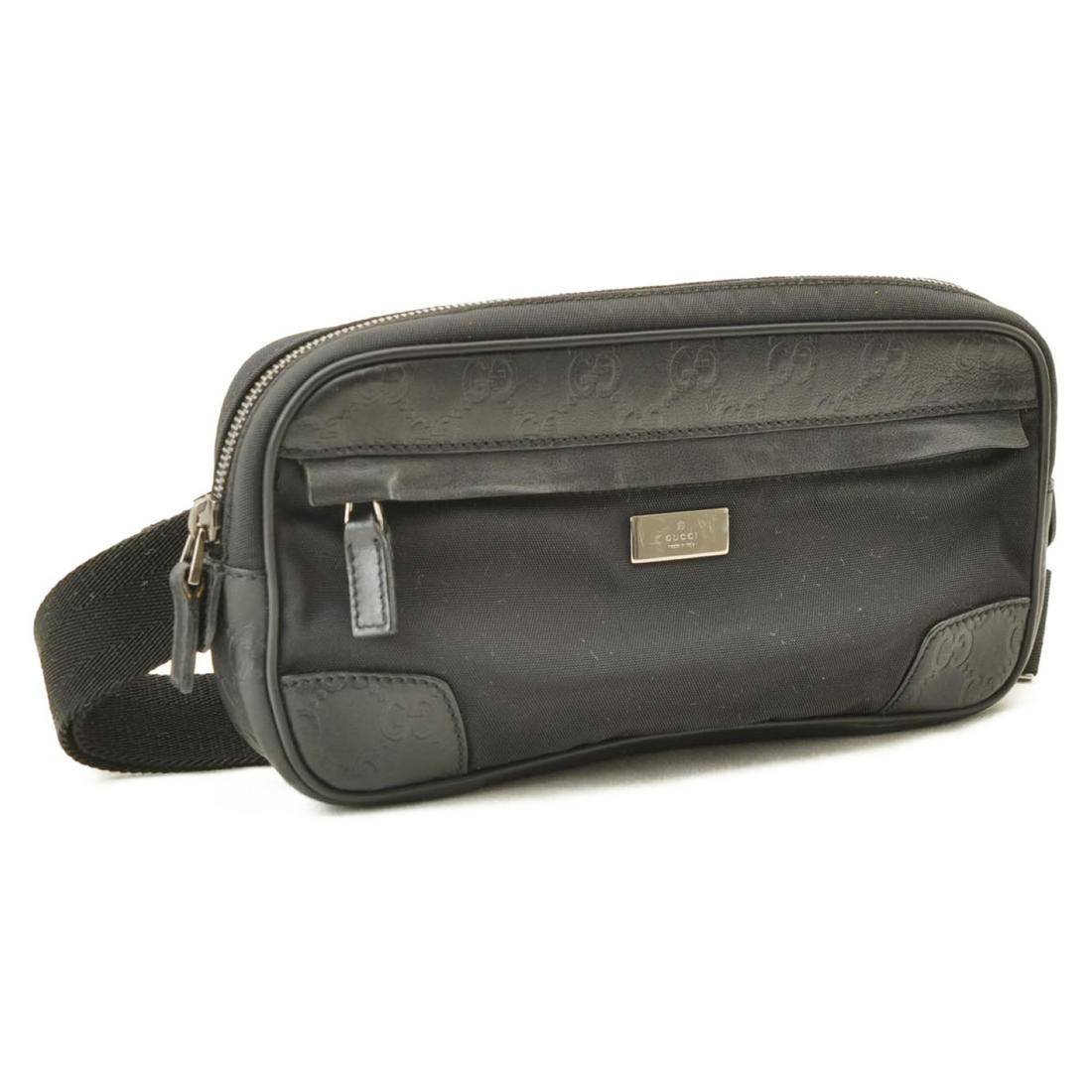 Authentic GUCCI Leather / Nylon Waist Bag: Brand: GUCCI Material: Leather / Nylon Style: Waist Bag Color: Black Size(inch): W9.44 x H5.11 x D1.57inch / Waist 15.35-20.86â€³(Approx) Country of Origin: Italy Accessory: There is no item box a