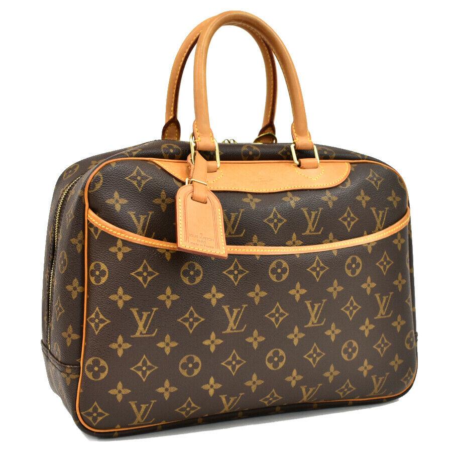Authentic LOUIS VUITTON DEAUVILLE Canvas Hand Bag: Brand: LOUIS VUITTON Material: Canvas Style: Hand Bag Color: Brown Size(inch): W:13.8"Ã—H:10.6"Ã—D:5.5"Handle:13" Country of Origin: France Come with: Name tag All Bidhaus items come with a 100%