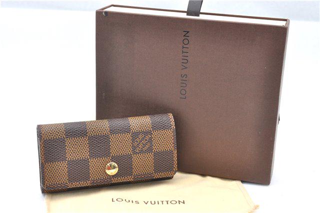 Authentic LOUIS VUITTON Damier Canvas Key Case: Brand: LOUIS VUITTON Material: Damier Canvas Style: Key Case Color: Brown Size(inch): W4.1 x H2.2 x D0.4"(Approx) Country of Origin: France Accessory: Item Box,Dust Bag All Bidhaus items come with a 1