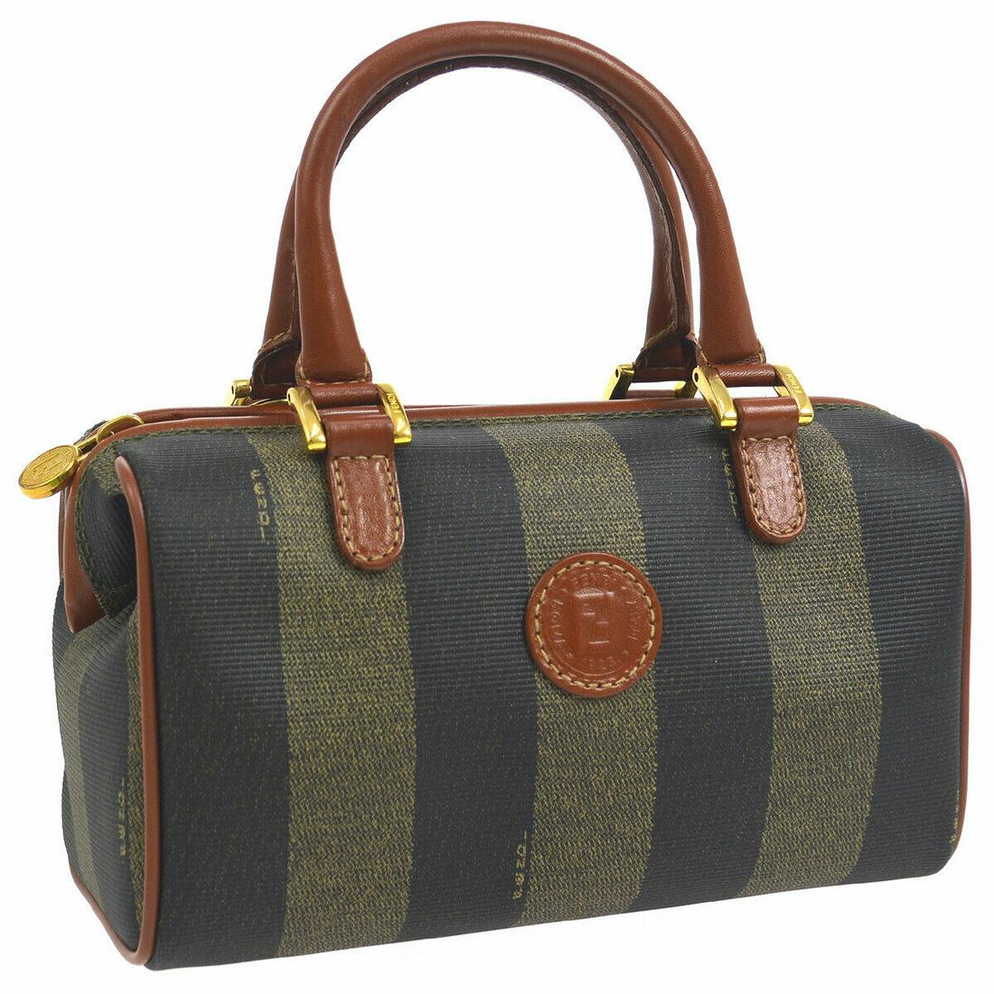 Authentic FENDI MINI PVC, Leather Hand Bag: Brand: FENDI Material: PVC, Leather Style: Hand Bag Color: Brown, Black Size(inch): W7.9 x H4.9 x D3.5 " Country of Origin: Italy Come with: Dust Bag All Bidhaus items come with a 100% money-back auth