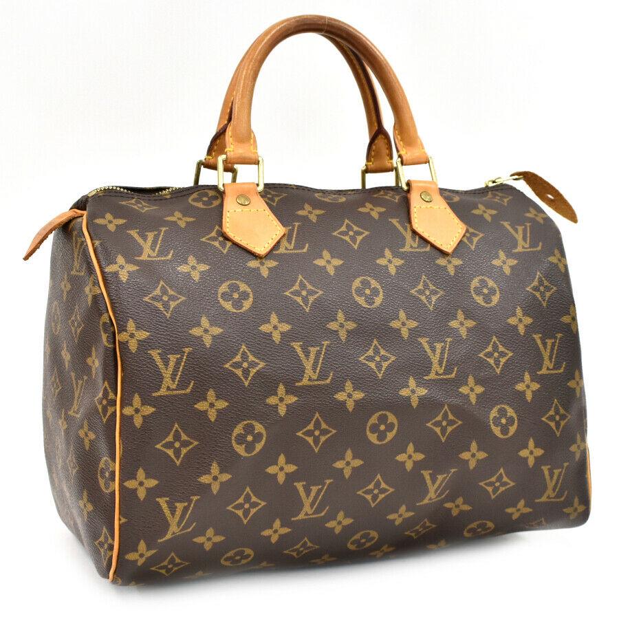 Authentic LOUIS VUITTON SPEEDY 30 Canvas Hand Bag: Brand: LOUIS VUITTON Material: Canvas Style: Hand Bag Color: Brown Size(inch): W:11.8"Ã—H:8.3"Ã—D:6.7"Handle:11" Country of Origin: France Come with: None All Bidhaus items come with a 100% mone