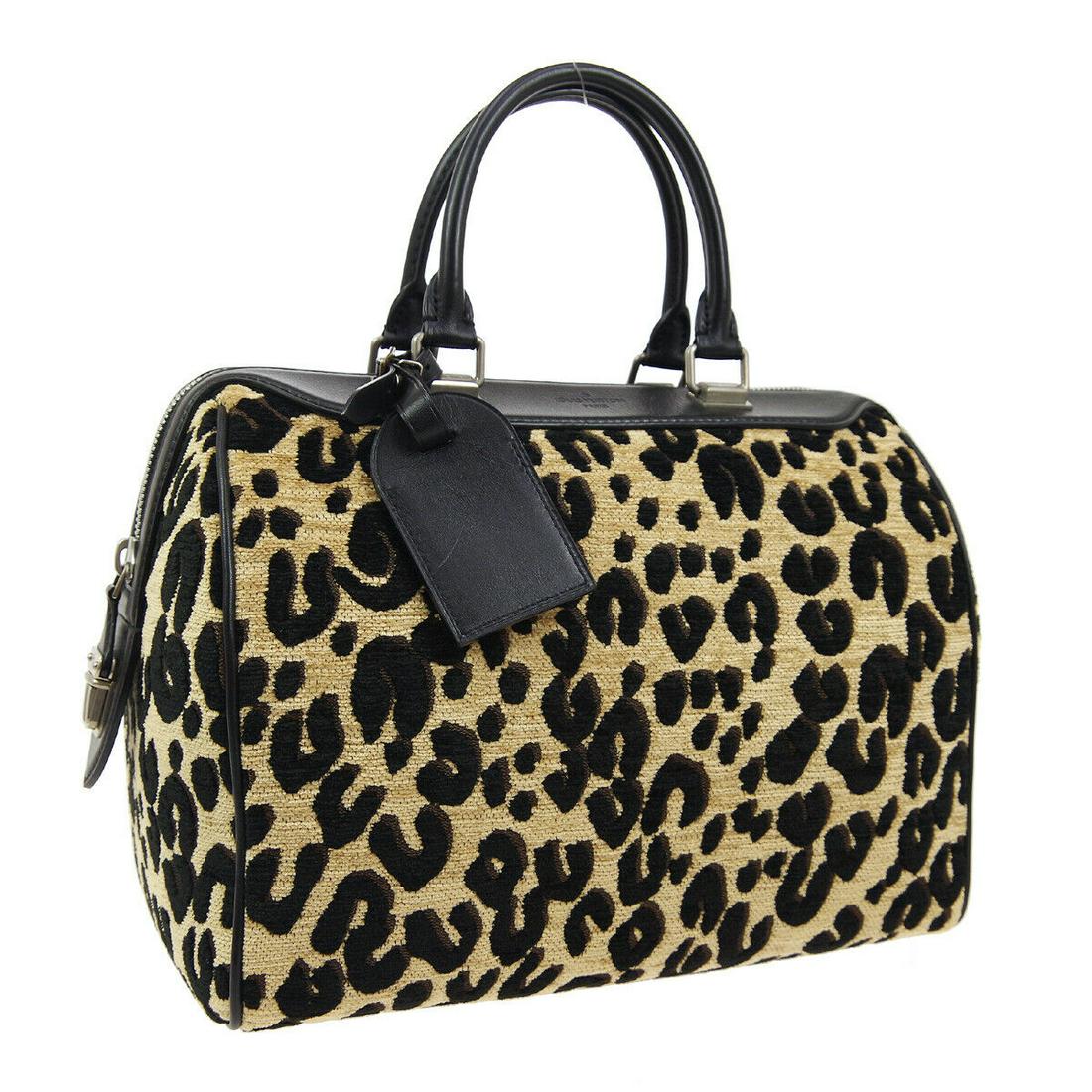 Authentic LOUIS VUITTON SPEEDY Jacquard Canvas, Leather: Brand: LOUIS VUITTON Material: Jacquard Canvas, Leather Style: Hand Bag Color: Brown, Black Size(inch): W12.2 x H9.8 x D7.5 " / Strap Drop: 4.3 Size(inch): W 12.2 x H 9.8 x D 7.5 "Handle Drop. 4.3 " C