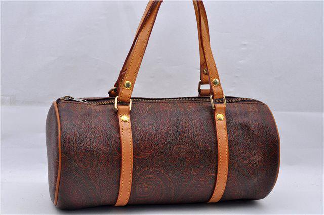 Authentic ETRO PVC/Leather Hand Bag: Brand: ETRO Material: PVC/Leather Style: Hand Bag Color: Brown Size(inch): W11.8 x H5.5 x D5.3" / Handle Drop 5.9"(Approx) Country of Origin: Italy Accessory: There is no ItemBox and DustBag.We will s