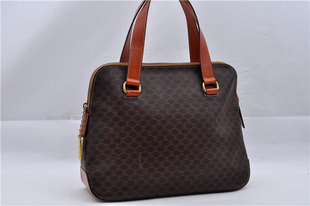 Authentic CELINE PVC/Leather Hand Bag: Brand: CELINE Material: PVC/Leather Style: Hand Bag Color: Brown Size(inch): W13.8 x H9.8 x D4.7" / Handle Drop 5.9"(Approx) Country of Origin: Italy Accessory: There is no ItemBox and DustBag.We will