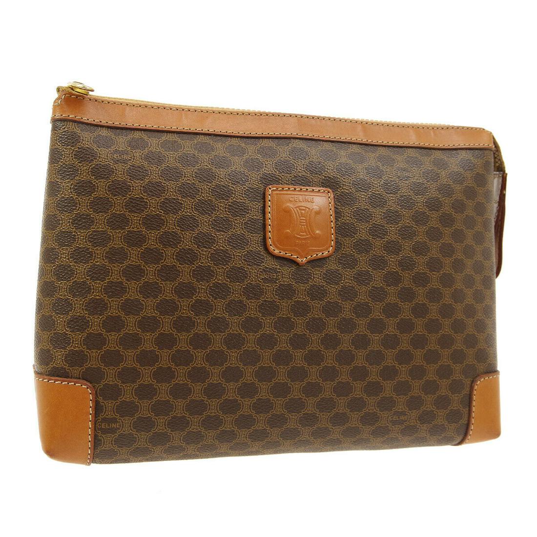 Authentic CELINE PVC, Leather Clutch: Brand: CELINE Material: PVC, Leather Style: Clutch Color: Brown Size(inch): W11.0 x H8.3 x D2.8 " Country of Origin: Italy Come with: - All Bidhaus items come with a 100% money-back authenticity guara