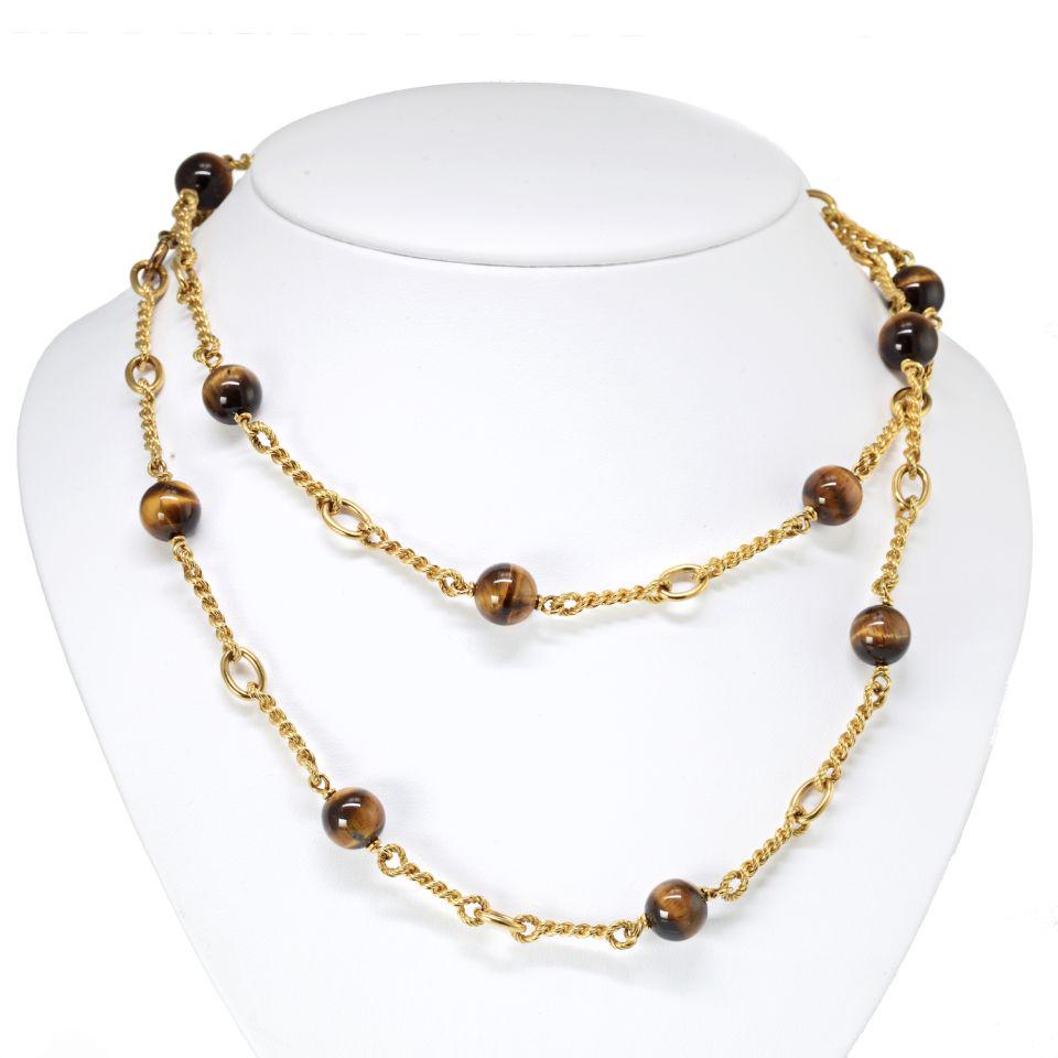 Authentic Van Cleef & Arpels Circa 1970's Vintage: Type: Vintage Necklaces Brand: Van Cleef & Arpels Style: Circa 1970 s Metal: 18K Yellow Gold Grams: 63.1 Other Details: 1970 s Tiger s Eye French Bead All Bidhaus item