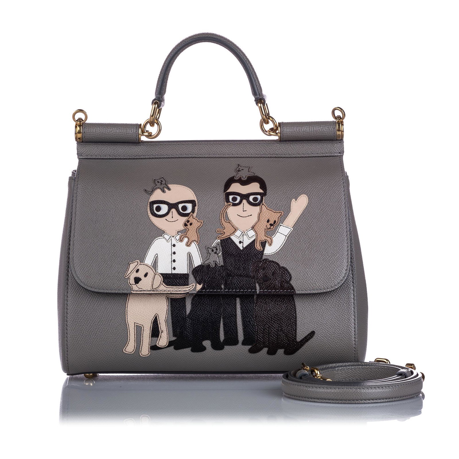 Authentic Dolce&Gabbana Medium Miss Sicily Stefano: The Miss Sicily features a leather body, a flat leather handle, a detachable shoulder strap, a front flap with magnetic snap closure, and an interior slip pocket.Brand: Dolce&Gabbana Model: Medium Mis