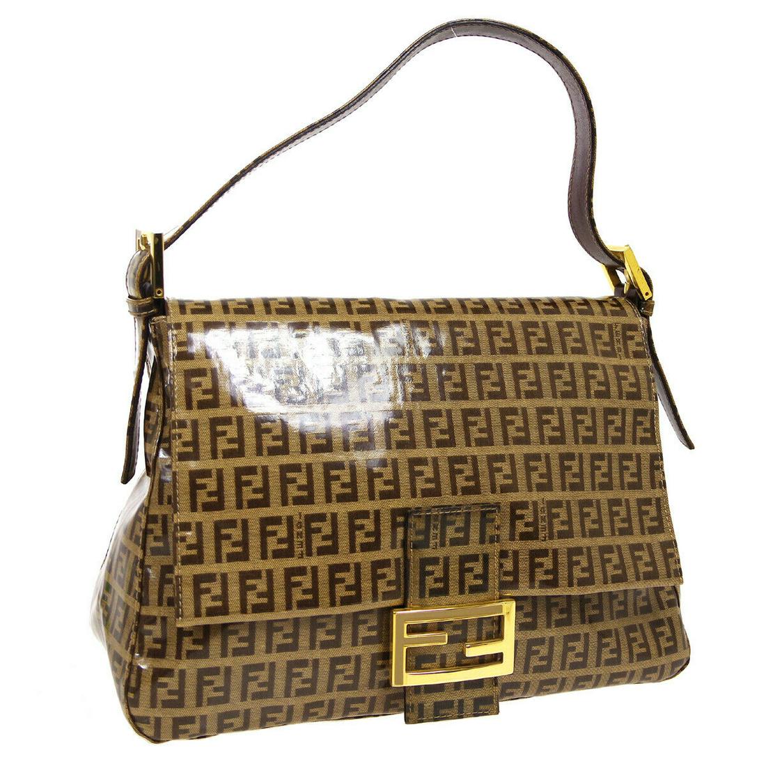Authentic FENDI BAGUETTE Vinyl, Leather Hand Bag: Brand: FENDI Material: Vinyl, Leather Style: Hand Bag Color: Brown Size(inch): W11.4 x H7.9 x D4.3 " Size(inch): W 11.4 x H 7.9 x D 4.3 "Strap Drop. 5.5 - 8.3 " Country of Origin: Italy Come with: Man
