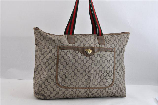 Authentic GUCCI PVC Tote Bag: Brand: GUCCI Material: PVC Style: Tote Bag Color: Brown Size(inch): W22.4 x H14.2 x D4.5"/ Strap Drop 10.2"(Approx) Country of Origin: Italy Accessory: There is no ItemBox and DustBag.We will send onl