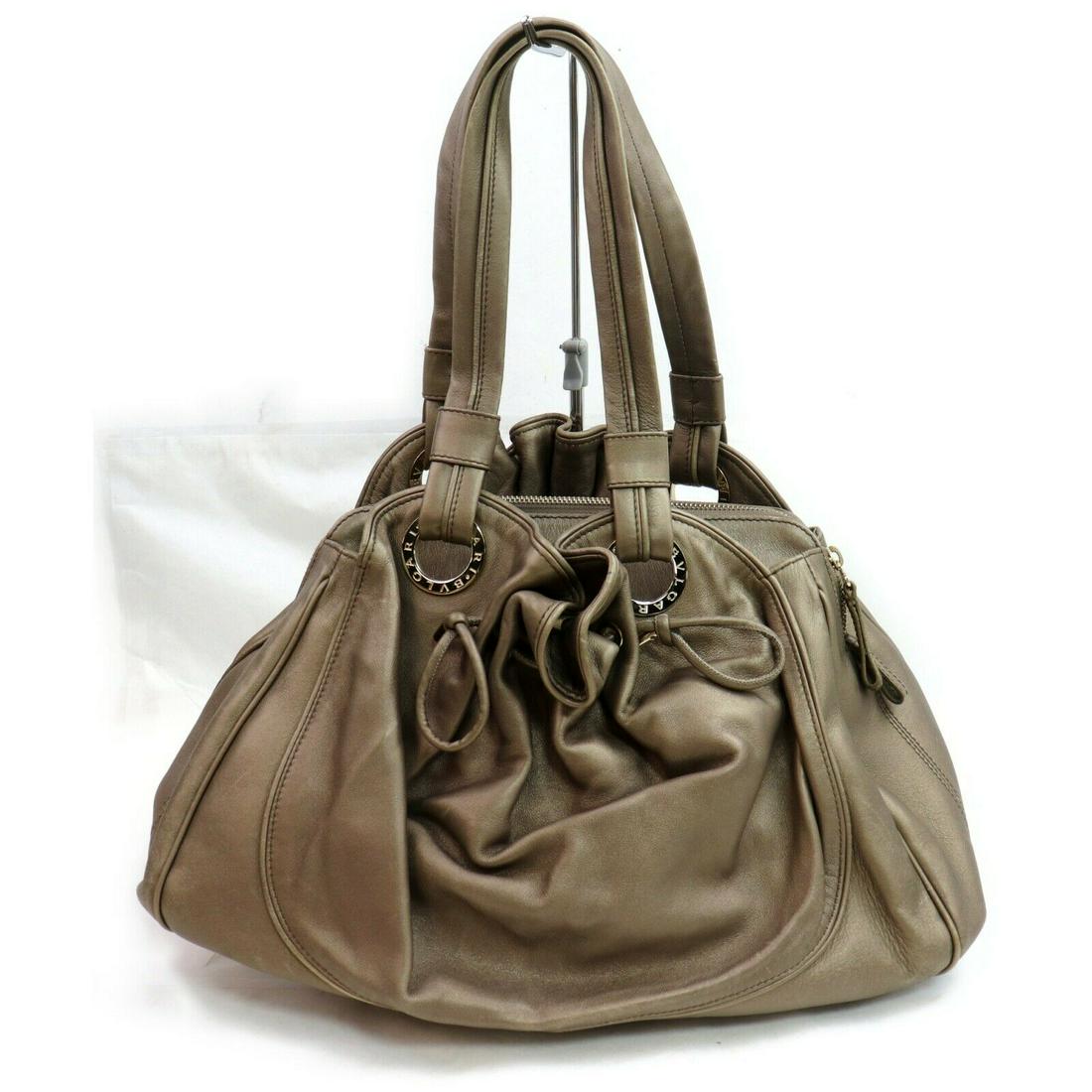 Authentic BVLGARI Leather Hand Bag: Brand: BVLGARI Material: Leather Style: Hand Bag Color: Grays Size(inch): W14.5 inch(approx) /37 cm(approx) x H10.2 inch(approx) /26 cm(approx) x D5.11 inch(approx) /13 cm(approx) " Country of Origin: