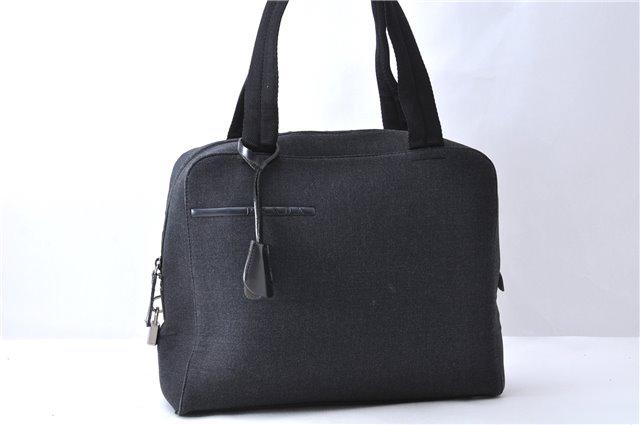 Authentic PRADA Canvas Hand Bag: Brand: PRADA Material: Canvas Style: Hand Bag Color: Black Size(inch): W12.6 x H10.2 x D4.1" / Handle Drop 6.7"(Approx) Country of Origin: Italy Accessory: Padlock and key All Bidhaus items come with 