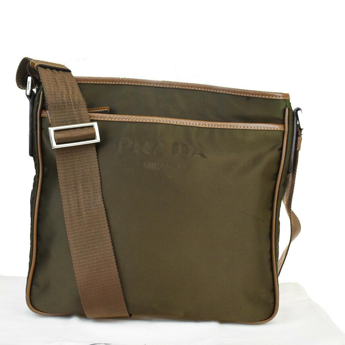 Authentic PRADA Leather, Nylon Shoulder Bag: Brand: PRADA Material: Leather, Nylon Style: Shoulder Bag Color: Khaki Size(inch): W 10.2 x H 9.4 x D 2.2 "(approx.) Country of Origin: Italy Come with: Dust bag All Bidhaus items come with a 100% mon