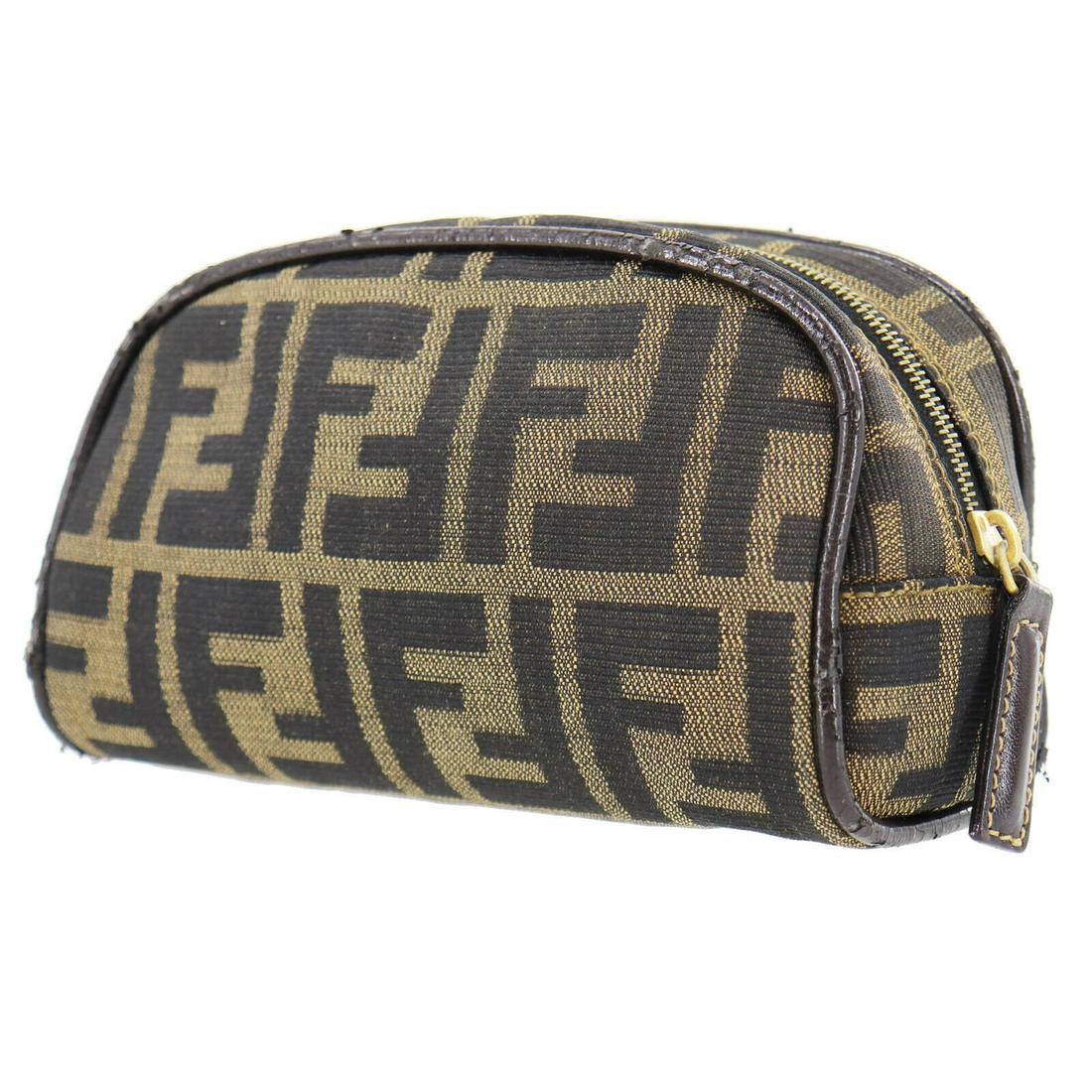 Authentic FENDI VINTAGE Canvas Pouch: Brand: FENDI Material: Canvas Style: Pouch Color: Brown Black Size(Inch): H 3.7 x D 2.7 x L 5.9 Country of Origin: Italy Come with: - All Bidhaus items come with a 100% money-back authenticity guarant