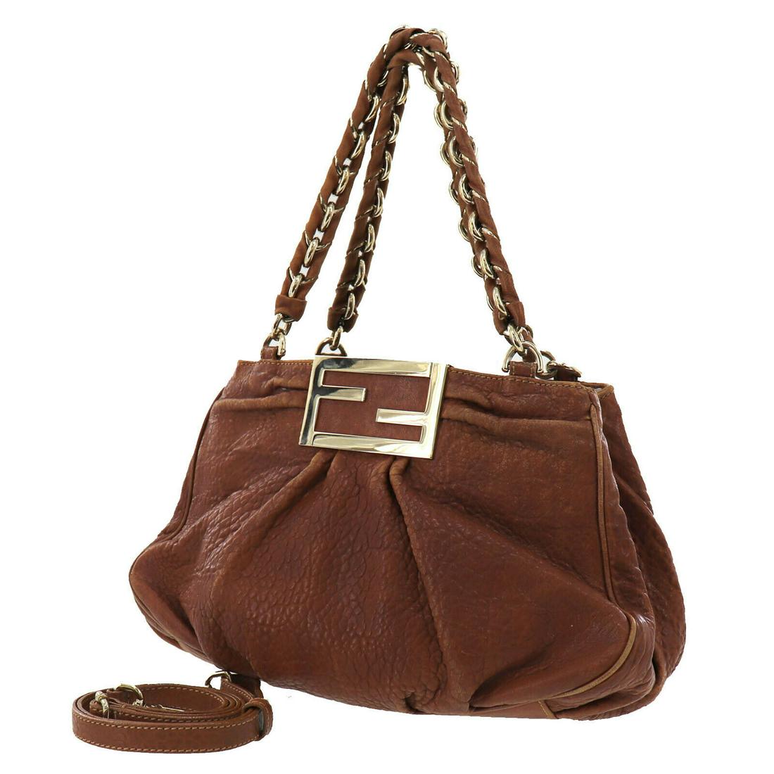 Authentic FENDI VINTAGE Leather Hand Bag: Brand: FENDI Material: Leather Style: Hand Bag Color: Brown Size(Inch): H 8.2 x D3.9 x L 13.3Handle : 17.7 Country of Origin: Italy Come with: Shoulder StrapInstruction Card All Bidhaus items come wit
