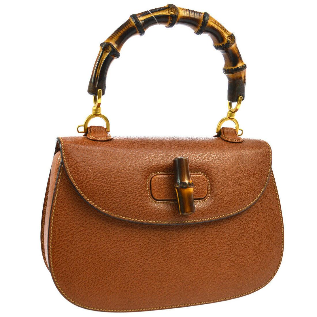 Authentic GUCCI Leather Hand Bag: Brand: GUCCI Material: Leather Style: Hand Bag Color: Brown Size(inch): W10.6 x H6.9 x D3.0 " / Strap Drop: 18.9 Country of Origin: Italy All Bidhaus items come with a 100% money-back authenticity gua