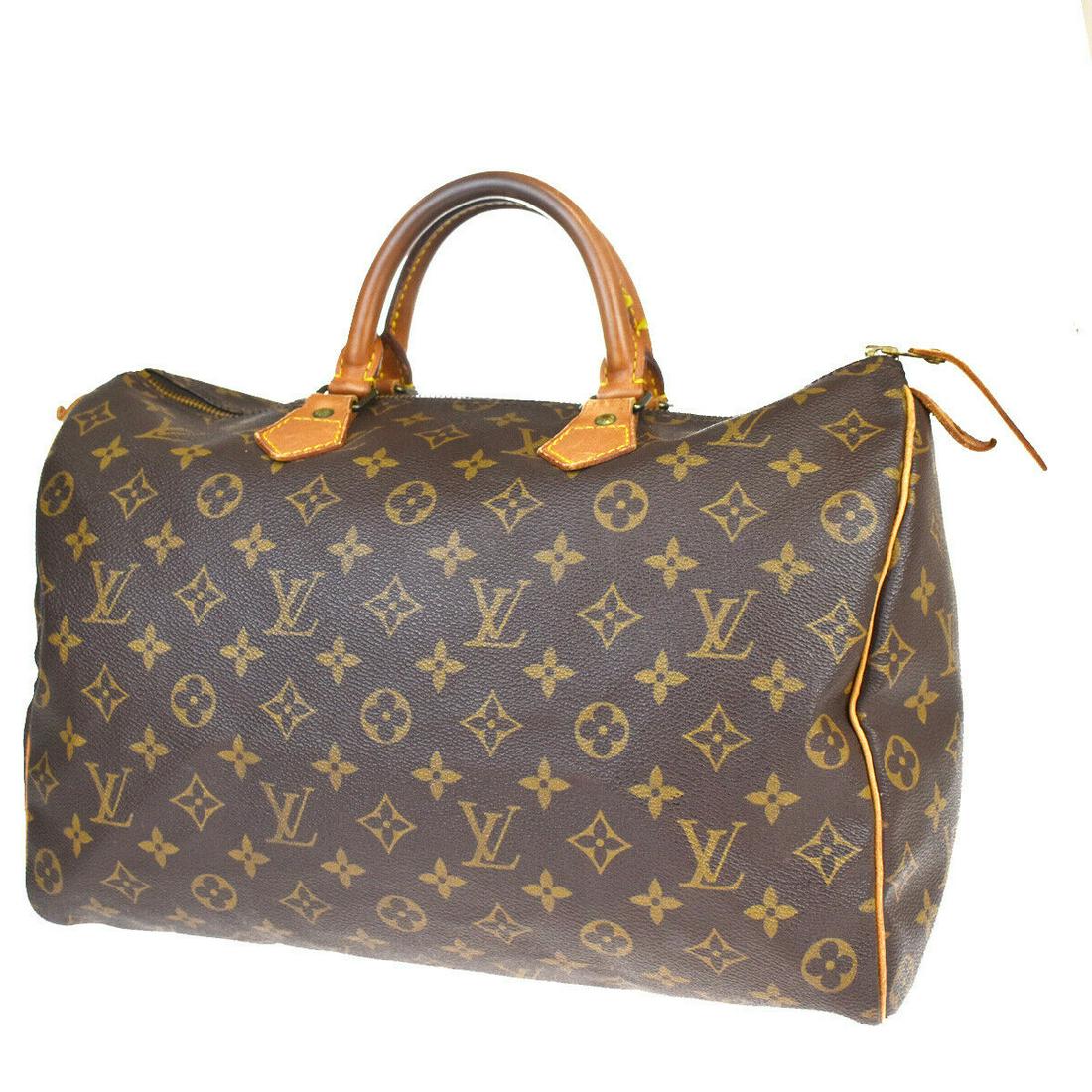 Authentic LOUIS VUITTON SPEEDY 35 Monogram Leather Hand: Brand: LOUIS VUITTON Material: Monogram Leather Style: Hand bag Color: Brown Size(inch): W 13.8 x H 9.4 x D 7.1"(approx.) Country of Origin: France Come with: - All Bidhaus items come with a 100% mone