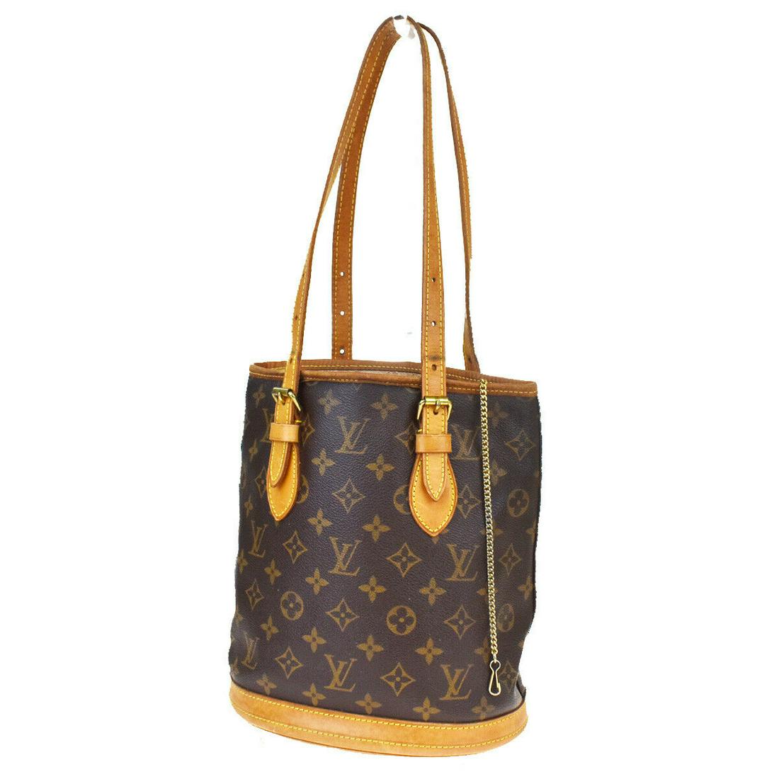 Authentic LOUIS VUITTON BUCKET PM Monogram , Leather: Brand: LOUIS VUITTON Material: Monogram , Leather Style: Shoulder bag Color: Brown Size(inch): W 8.7 x H 9.8 x D 5.9 "(approx.) Country of Origin: U.S.A.. Come with: - All Bidhaus items come with a 10