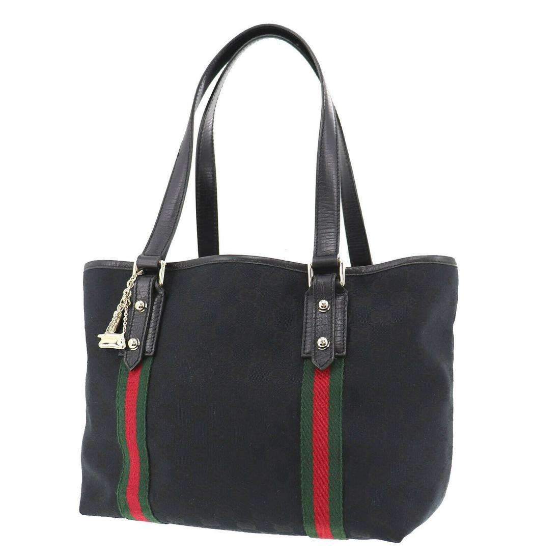 Authentic GUCCI Canvas Hand Bag: Brand: GUCCI Material: Canvas Style: Hand Bag Color: Black Size(Inch): H 8.6 x D 5.3 x L 14.9Handle: 19.6 Country of Origin: Italy Come with: - All Bidhaus items come with a 100% money-back authentici