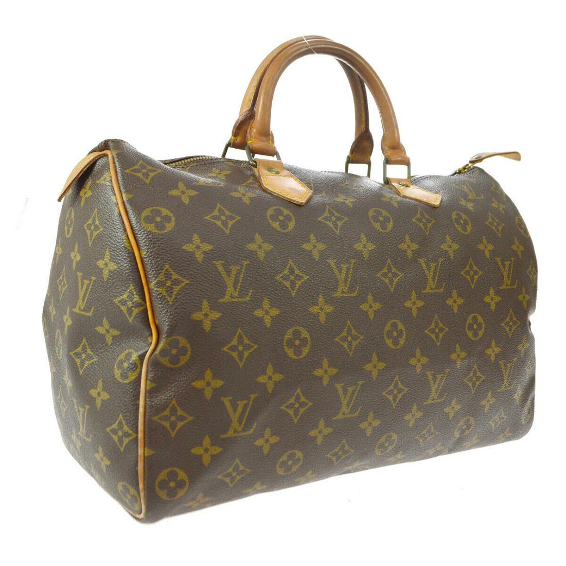 Authentic LOUIS VUITTON SPEEDY 35 Monogram Canvas,: Brand: LOUIS VUITTON Material: Monogram Canvas, Leather Style: Hand Bag Color: Brown Size(inch): W13.6 x H9.1 x D7.5 " Size(inch): W 13.6 x H 9.1 x D 7.5 "Handle Drop. 3.5 " Country of Origin: France 