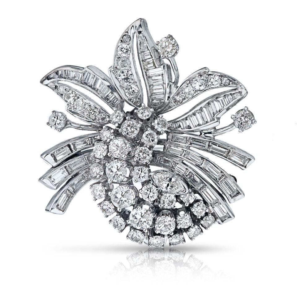 Platinum Vintage Brooch: Type: Vintage Brooches Metal: Platinum Grams: 12.9 Approximate Diamond Weight: 8.5 Cts Other Details: 97 RB MQ BAG All Bidhaus items come with a 100% money-back