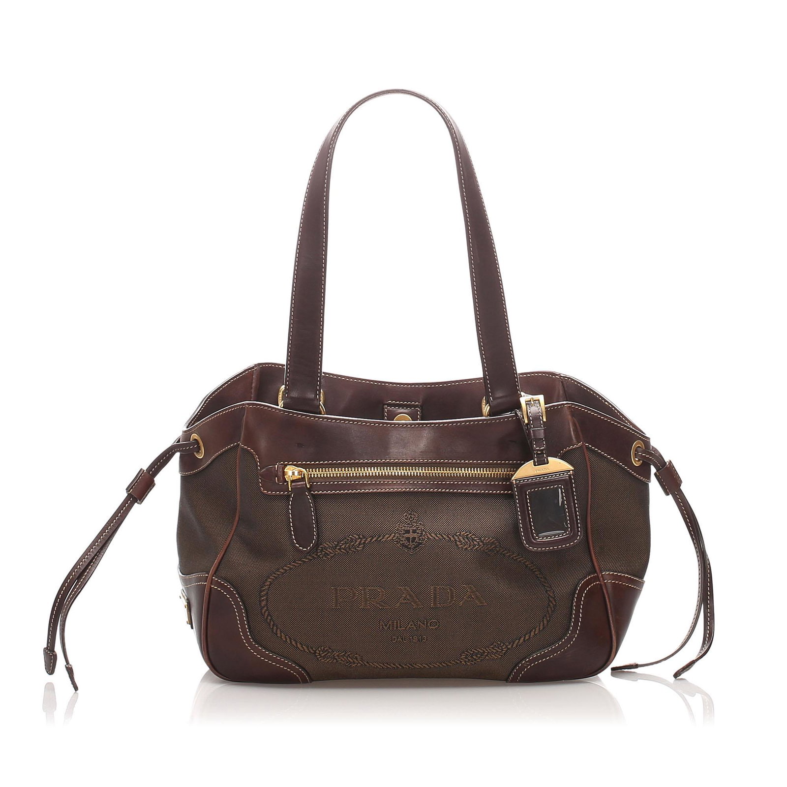 Authentic Prada Canapa Tote Bag: This tote bag features a canvas body with leather trim front and back exterior pockets flat leather straps a top magnetic snap button closure and interior zip and slip pockets. Brand: Prada Model: Can