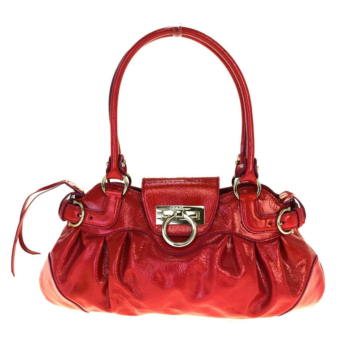 Authentic SALVATORE FERRAGAMO Patent Leather Shoulder: Brand: SALVATORE FERRAGAMO Material: Patent Leather Style: Shoulder bag Color: Pink Size(inch): W 14.2 x H 7.9 x D 3.1 "(approx.) Country of Origin: Italy Come with: - All Bidhaus items come with a 10