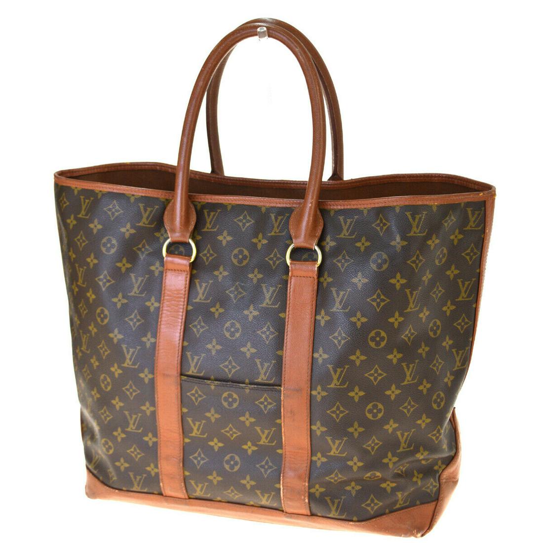 Authentic LOUIS VUITTON LEATHER Monogram , Leather Hand: Brand: LOUIS VUITTON Material: Monogram , Leather Style: Hand bag Color: Brown Size(inch): W 19.7 x H 15.7 x D 7.5 "(approx.) Country of Origin: France Come with: - All Bidhaus items come with a 100% 