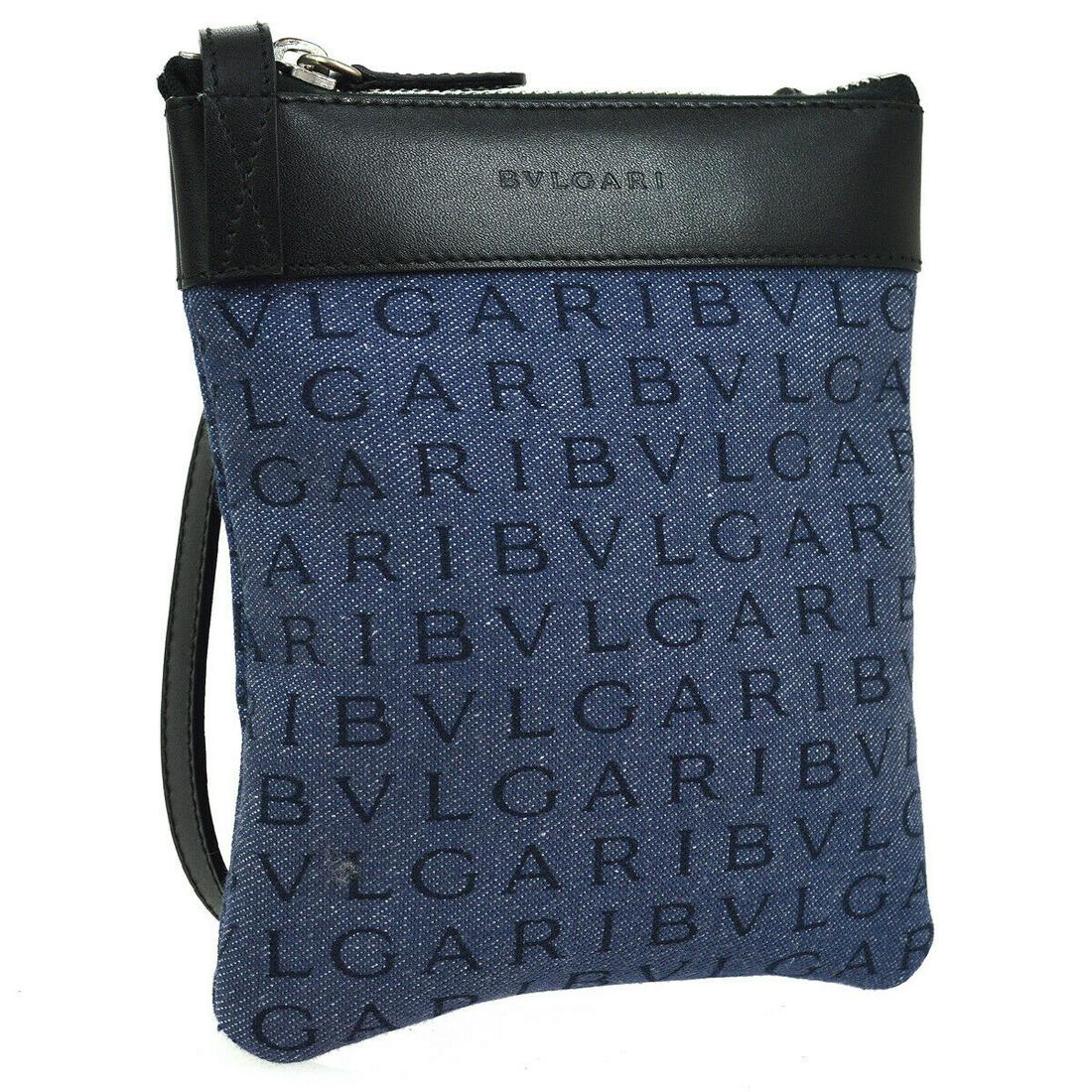 Authentic BVLGARI Denim, Leather Shoulder Bag: Brand: BVLGARI Material: Denim, Leather Style: Shoulder Bag Color: Blue, Black Size(inch): W5.5 x H6.7 x D0.4 " / Strap Drop: 20.9 Country of Origin: Italy Come with: Box, Control Card All Bidhaus ite