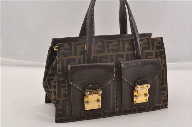 Authentic FENDI Canvas Hand Bag: Brand: FENDI Material: Canvas Style: Hand Bag Color: Brown Size(inch): W11.6 x H7.3 x D5.1" / Handle Drop 4.7"(Approx) Country of Origin: Italy Accessory: There is no ItemBox and DustBag.We will send 