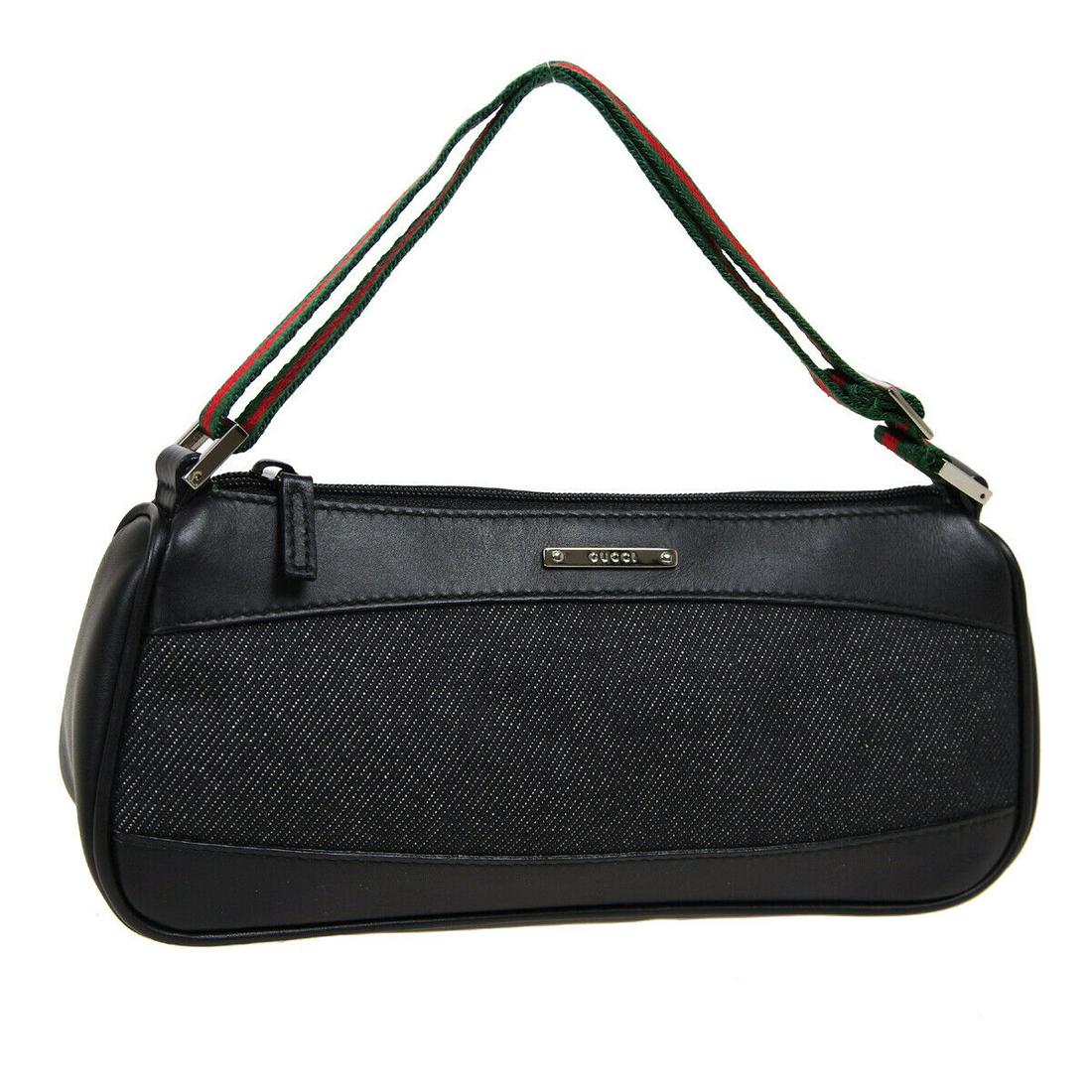 Authentic GUCCI Denim Canvas, Leather Hand Bag: Brand: GUCCI Material: Denim Canvas, Leather Style: Hand Bag Color: Black, Red, Green Size(inch): W8.5 x H3.7 x D2.4 " Size(inch): W 8.5 x H 3.7 x D 2.4 "Handle Drop. 3.5 - 7.9 " Country of Origin: It