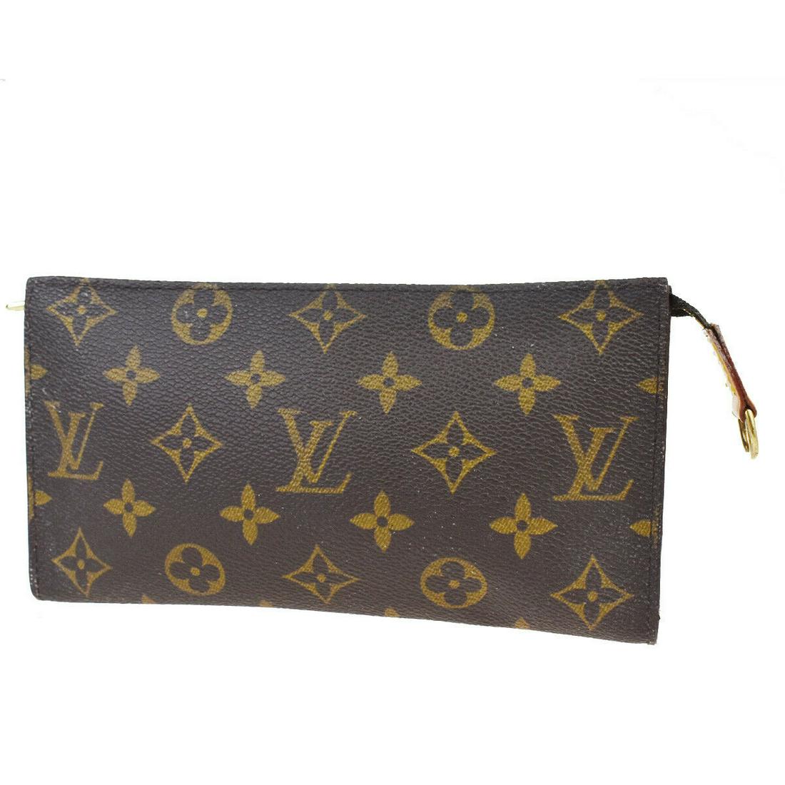 Authentic LOUIS VUITTON BUCKET GM Monogram , Leather: Brand: LOUIS VUITTON Material: Monogram , Leather Style: Pouch Color: Brown Size(inch): W 7.7 x H 4.3 x D 0.6 "(approx.) Country of Origin: France Come with: - All Bidhaus items come with a 100% money