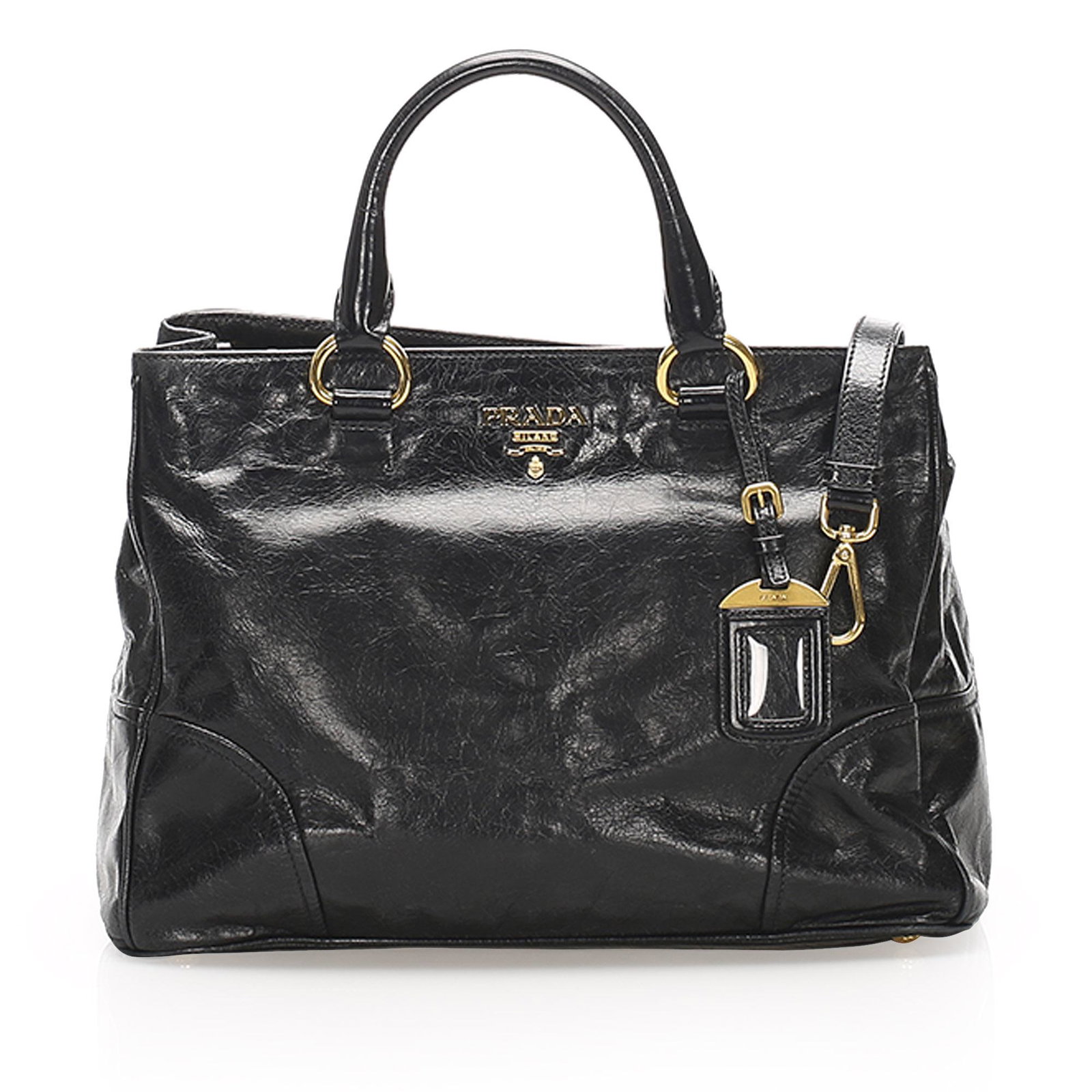 Authentic Prada Vitello Shine Satchel: This satchel features a leather body rolled leather handles a detachable flat leather strap an open top with a magnetic snap button closure a top zip compartment and interior zip and slip pockets. Bra