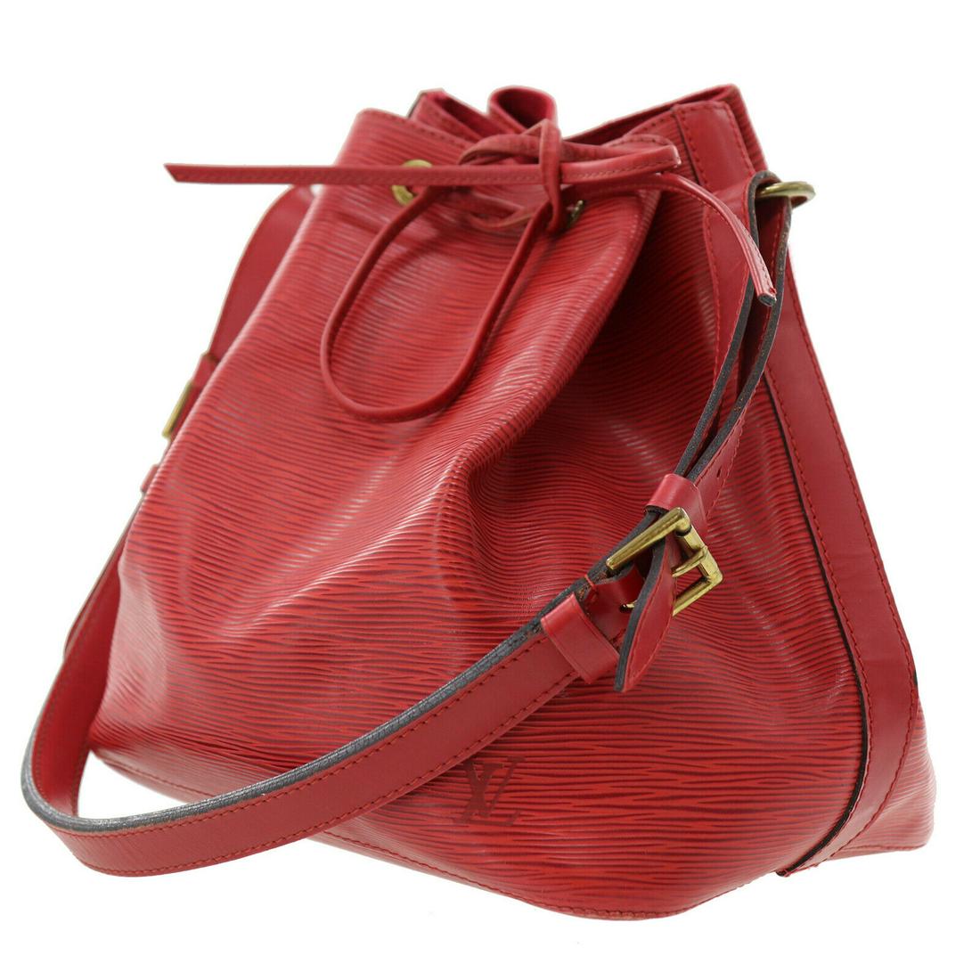 Authentic LOUIS VUITTON NOE Epi Leather Shoulder Bag: Brand: LOUIS VUITTON Material: Epi Leather Style: Shoulder Bag Color: Red Size(Inch): H 10.2 x D 7.4 x L 9.8Shoulder.29.9-36.2 Country of Origin: France Come with: - All Bidhaus items come with a 100%