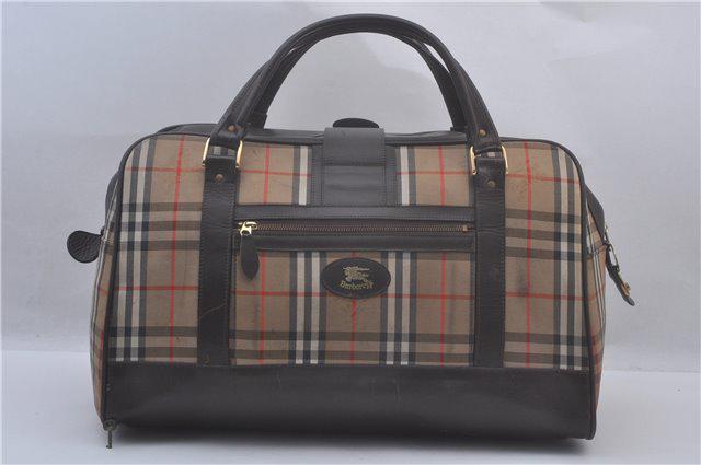 Authentic BURBERRYS Canvas Boston Bag: Brand: BURBERRYS Material: Canvas Style: Boston Bag Color: Beige Size(inch): W19.3 x H10.6 x D11.8" / Handle Drop 5.9"(Approx) Country of Origin: England Accessory: key, All Bidhaus items come with a