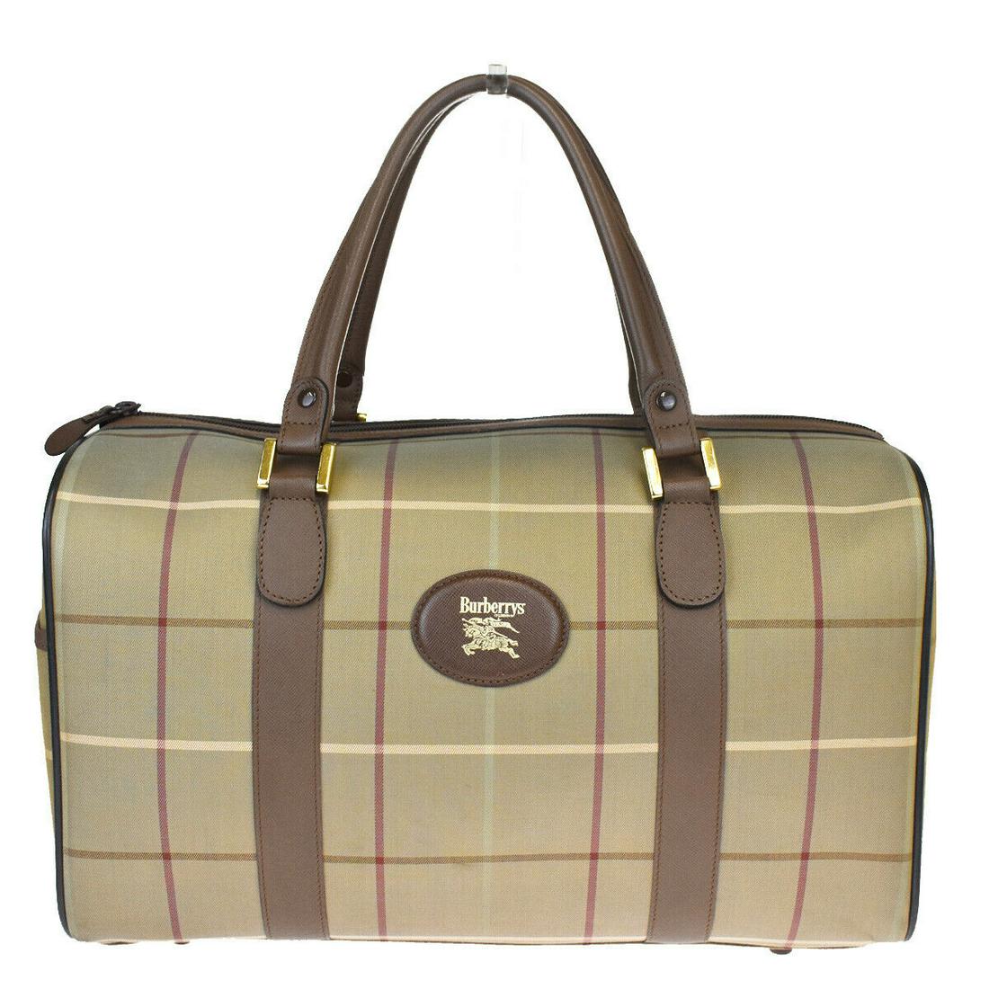 Authentic BURBERRYS Canvas Leather Hand Bag: Brand: BURBERRYS Material: Canvas Leather Style: Hand Bag Color: Brown Size(inch): W 15.4 x H 9.3 x D 7.3 "(approx.) Country of Origin: - Come with: - All Bidhaus items come with a 100% money-back aut