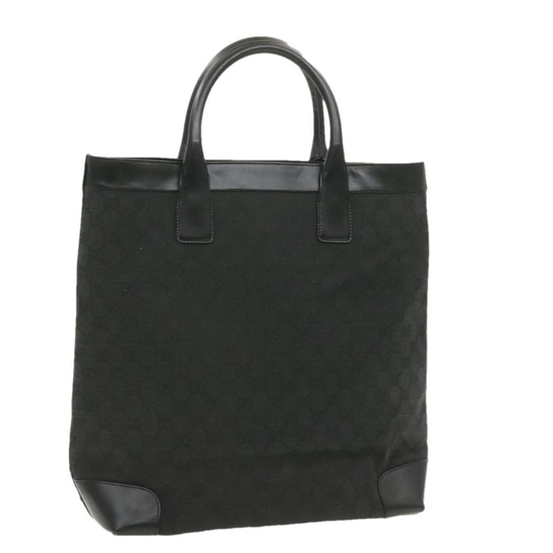 Authentic GUCCI GG Canvas Hand Bag Black Canvas: Brand: GUCCI Style: Hand Bag Material: Canvas Color: Black Made In: Italy Size (Inches): W12.59 x H14.56 x D5.51inch(Approx) Exterior Condition: Canvas : lose shape rubbing Interior Cond