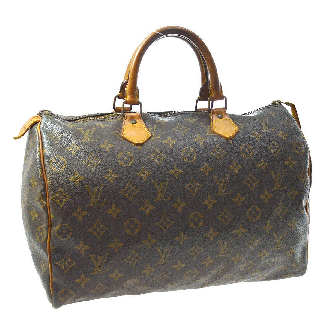 Authentic LOUIS VUITTON Speedy 35: Brand: LOUIS VUITTON Model: LOUIS VUITTON Speedy 35 Country of Origin: France Material: Canvas Color: Brown Size (Inch): W 14.2 x H 9.1 x D 7.5 " Handle Drop. 3.5 " Size (CM): W 36.0 x H 23.0 x D 19.0