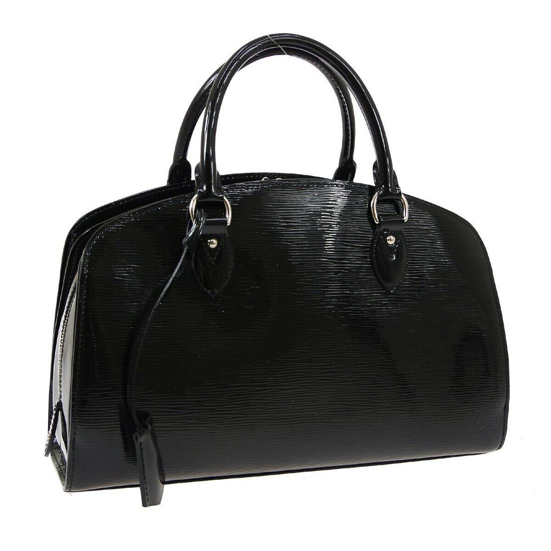 Authentic LOUIS VUITTON ELECTRIC PONT NEUF PM: Brand: LOUIS VUITTON Model: ELECTRIC PONT NEUF PM Country of Origin: France Material: Alcantara Color: Black Size (Inch): W 13.8 x H 9.1 x D 4.3 " Handle Drop. 4.3 " Size (CM): W 35.0 x H 23.0 x D 11.