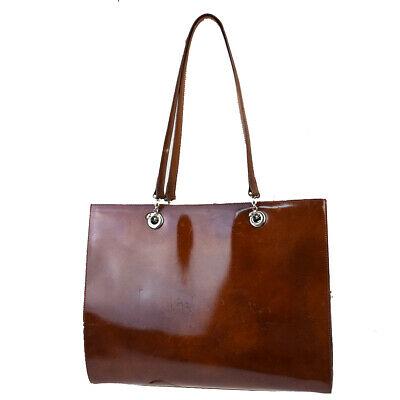 Authentic CARTIER Shoulder Bag: Brand: CARTIER Model: Shoulder Bag Country of Origin: France Material: Patent Leather Color: Brown Size (Inch): W14.2X H11X D4.7" Size (CM): W36X H28X D12Cm All Bidhaus items come with a 100 % money-b