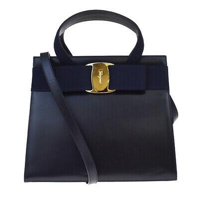 Authentic SALVATORE FERRAGAMO Hand Bag: Brand: SALVATORE FERRAGAMO Model: Hand Bag Country of Origin: Material: Leather Color: Navy Blue Size (Inch): W9.6X H7.9X D3.9" Size (CM): W24.5X H20X D10Cm All Bidhaus items come with a 100 % money-b