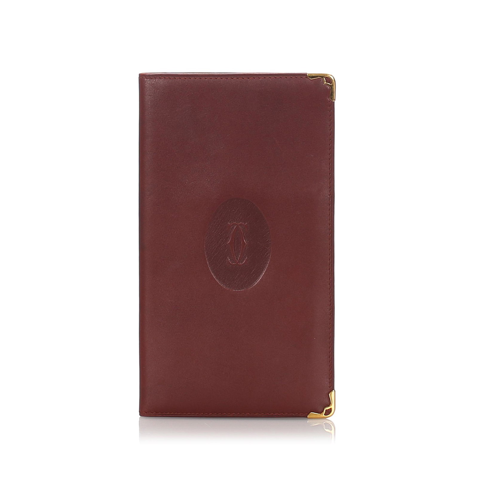 Authentic Cartier Leather Must De Cartier Wallet: This long wallet features a leather body, a front flap, and interior slip pockets.Brand: Cartier Model: Leather Must De Cartier Wallet Origin: France Style: Others Category: Long Wallets Color: Red x 