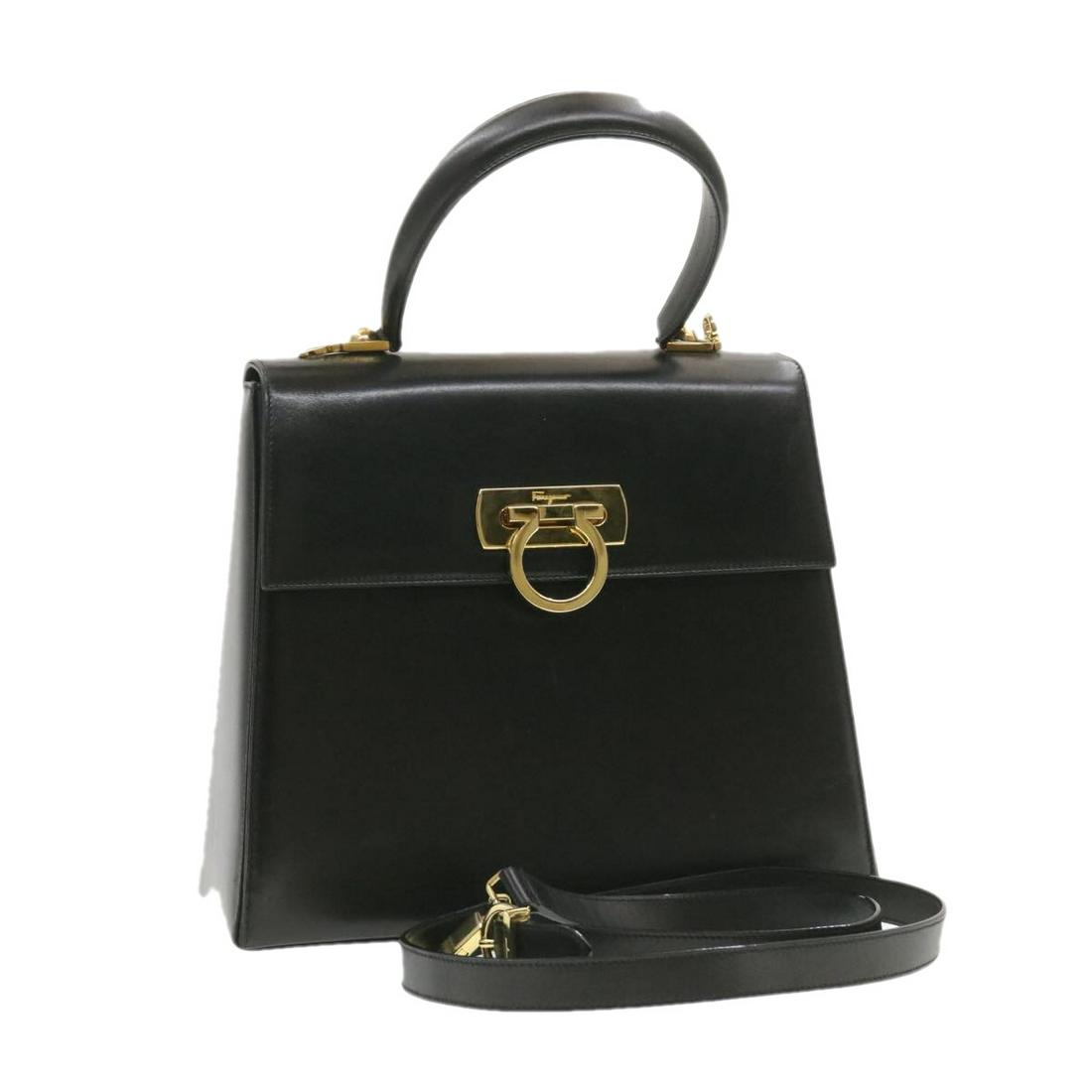 Authentic Salvatore Ferragamo Hand Bag Shoulder Bag: Brand: Salvatore Ferragamo Style: Shoulder Bag Material: Leather Color: Black Made In: Italy Size (Inches): W10.62 x H9.05 x D4.33inch / Shoulder Drop 19.68-20.86inch(Approx) Exterior Condition: L