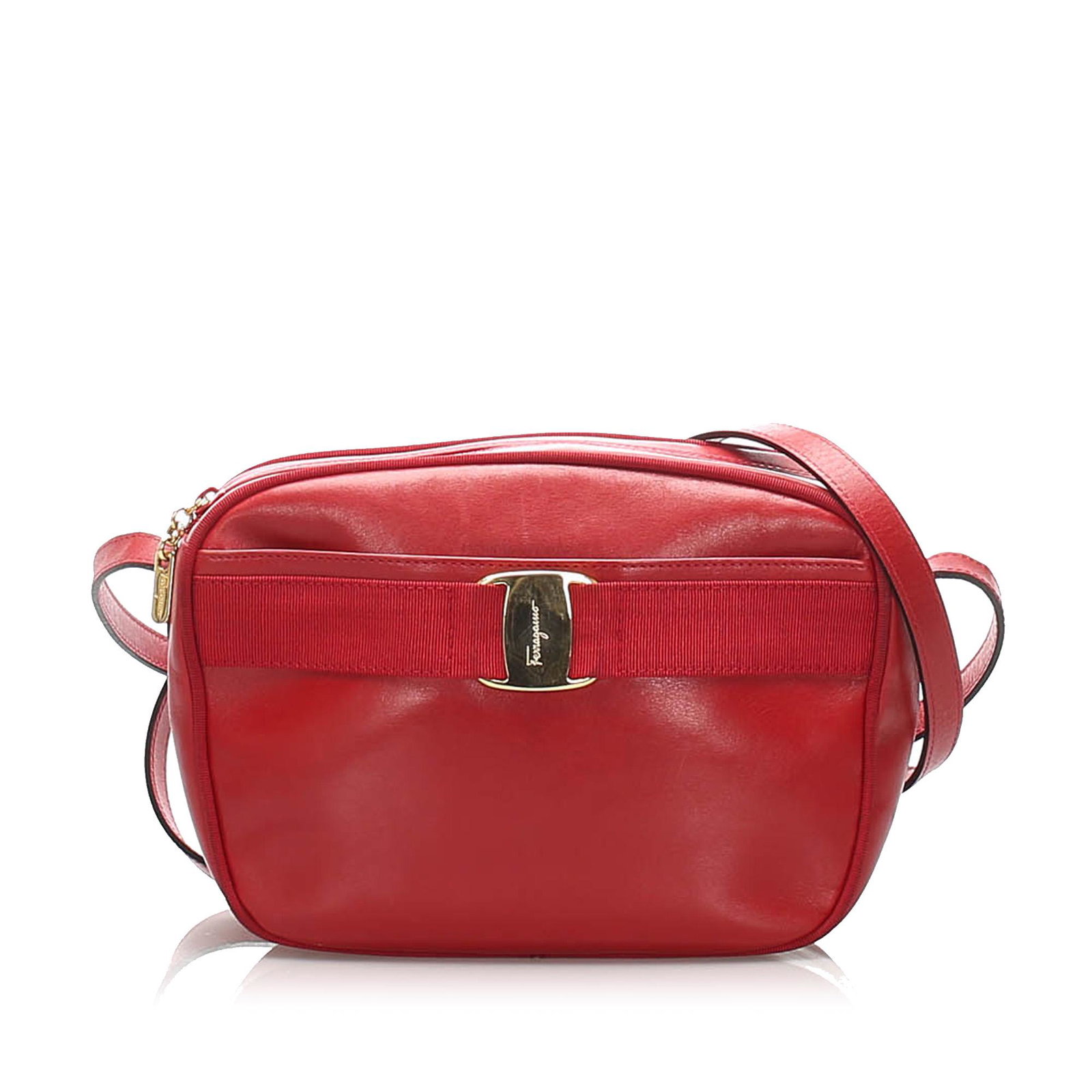 Authentic Ferragamo Vara Leather Crossbody Bag: This crossbody features a leather body with a gold-tone hardware a front exterior slip pocket a flat leather strap a top zip closure and an interior zip pocket. Brand: Ferragamo Model: Vara Leather Cr